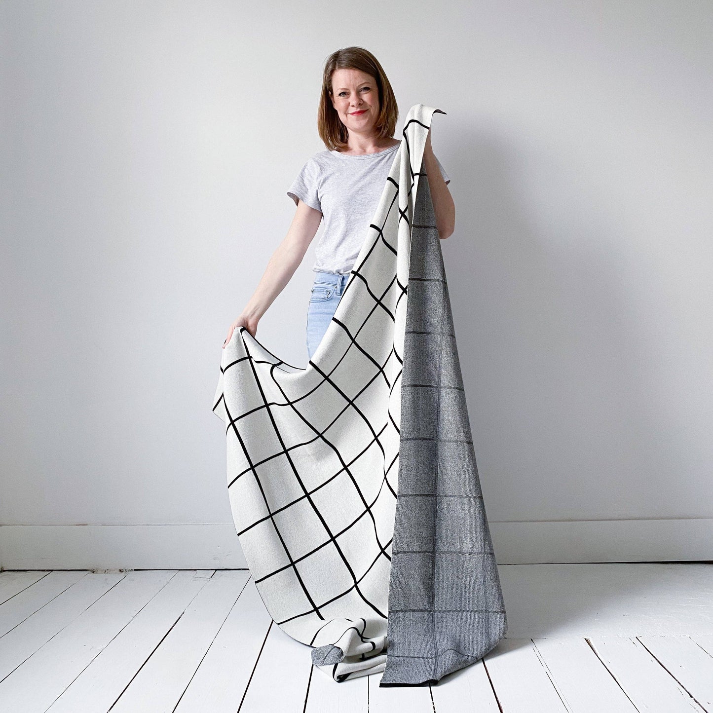 Strickdecke aus Baumwolle — Gitter: Schwarz