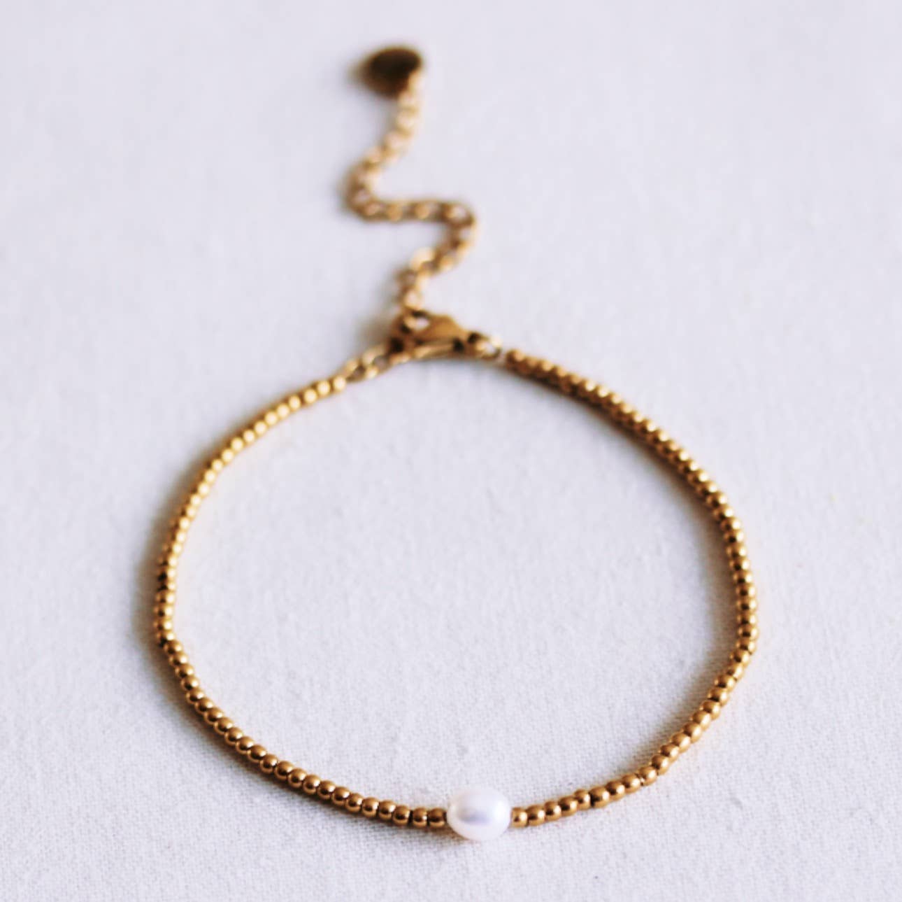 Perlenarmband mit Perle