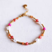 Perlenarmband mit facettierten Perlen – Koralle/Orange/Rosa