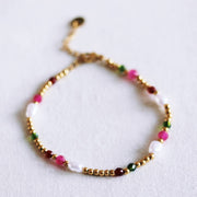 Perlenarmband mit facettierten Perlen - grün/fuchsia/rot
