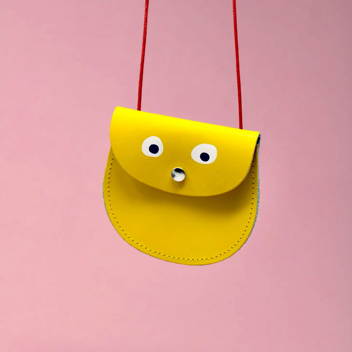 Ark Colour Design – Lederbrustbeutel mit Augen, gelb