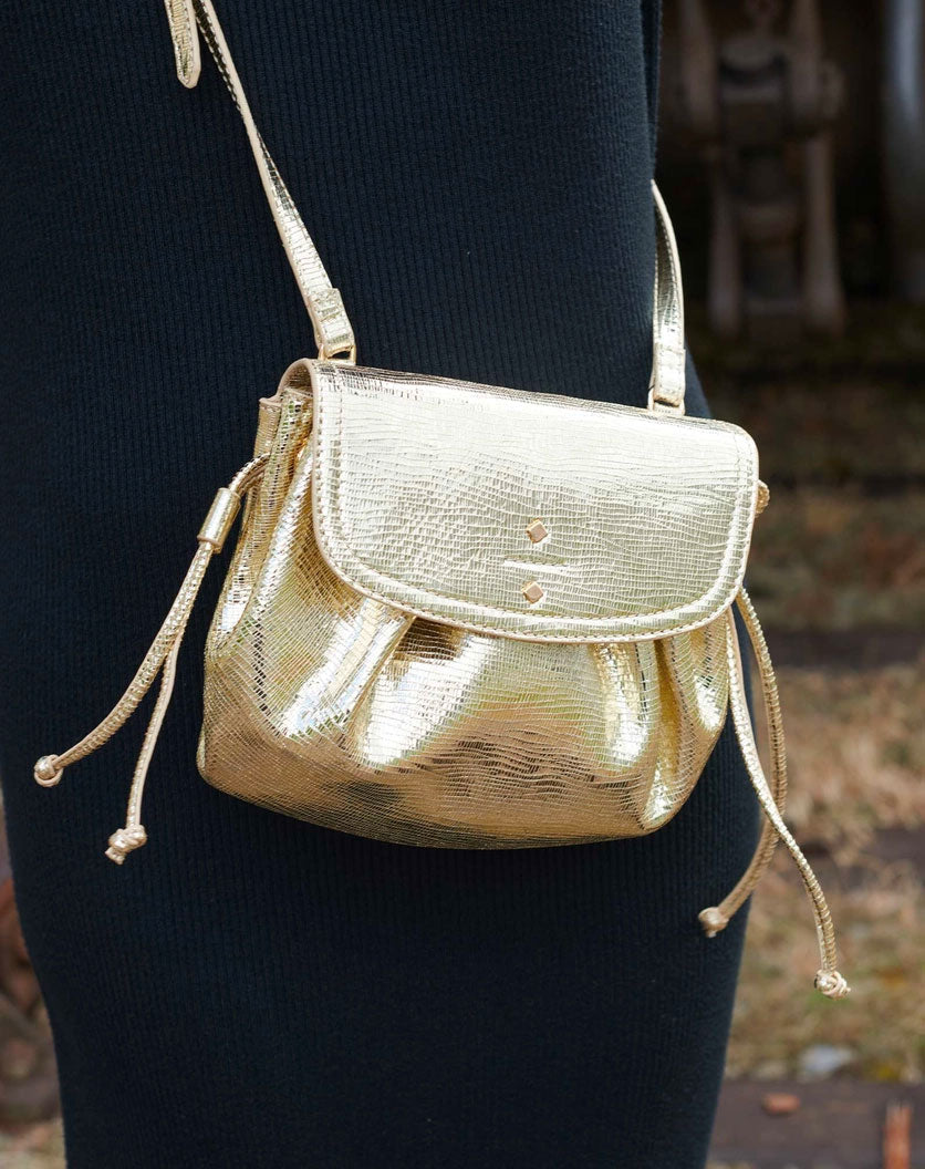 Kleine Bande – Goldene Tasche mit Prägung