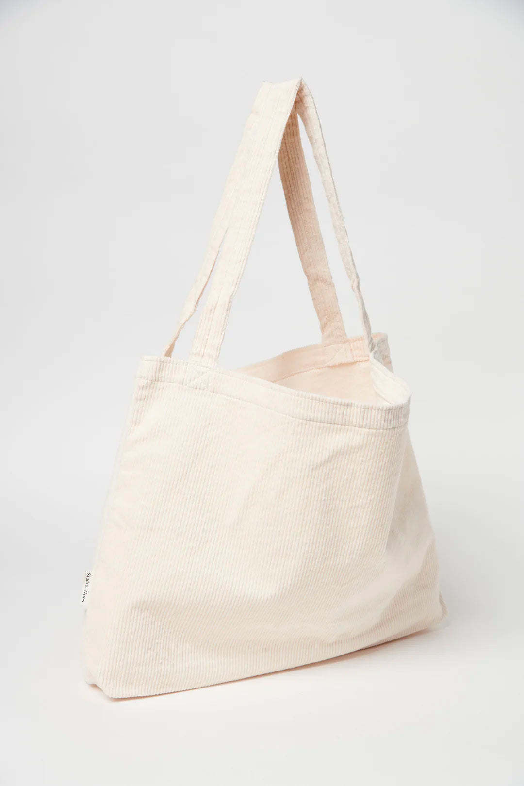 Studio Noos – Cremeweiße Feincord Mom-Bag